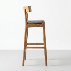 Butaco Onda en madera maciza de flormorado, vista lateral, hecho a mano por Canorá en Bogotá