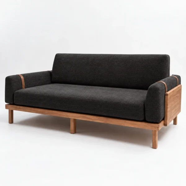Sofá Juan en madera maciza tapizado en tela Charcoal, vista tres cuartos